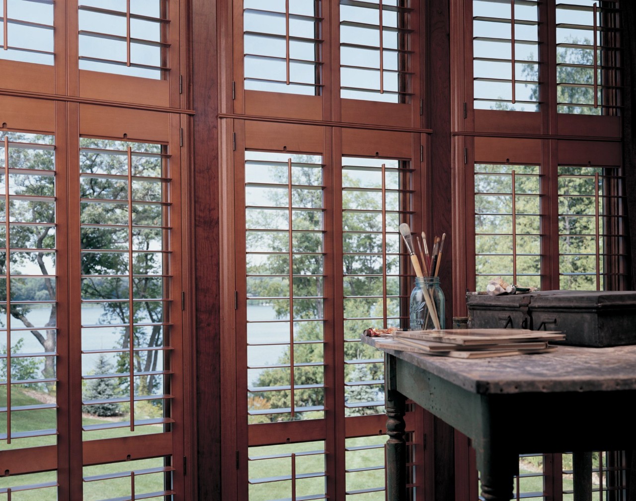 Elevating your interior design with Hunter Douglas Heritance® Hardwood Shutters installed in a home